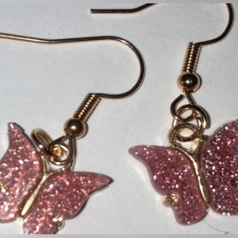 Pink glittery butterfly earrings